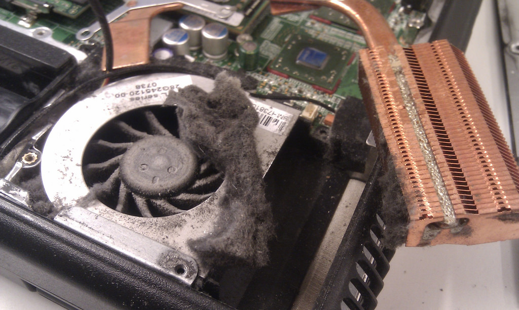 Your laptop's fan is clogged up with dust.